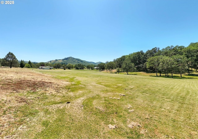 7654 N Bank Rd, Roseburg, OR 97470 - view of green lawn with a mountain view and a view of countryside