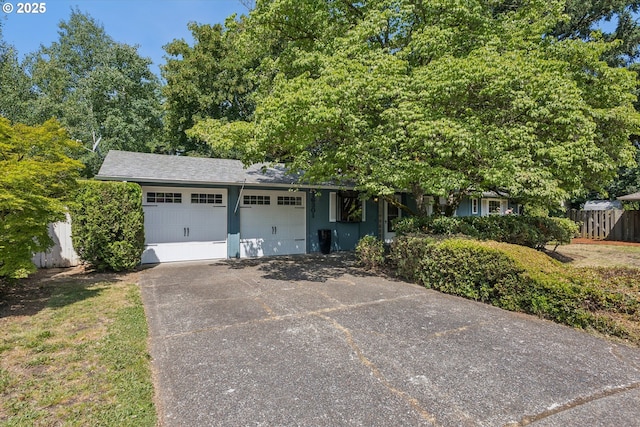 16301 SE Franklin St, Portland, OR 97236 - view of front facade featuring a garage and concrete driveway