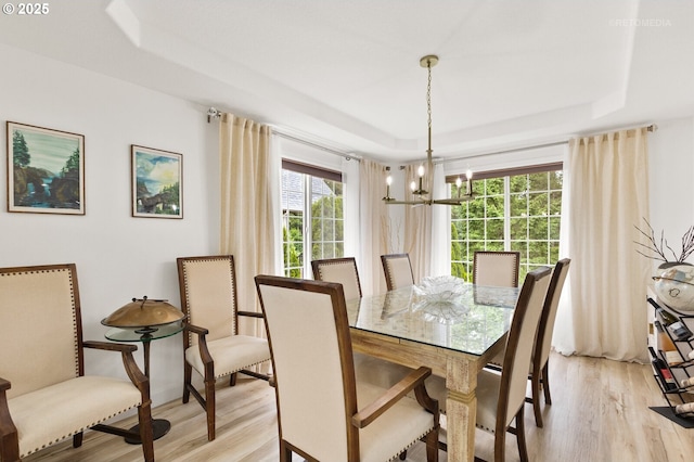 2136 N Thorne St, Newberg, OR 97132 - dining area with a raised ceiling, light wood-style floors, and a chandelier