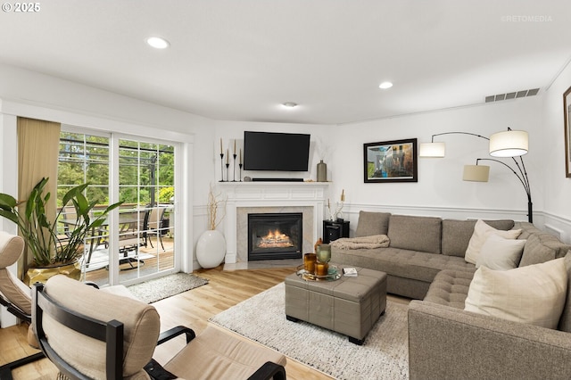 2136 N Thorne St, Newberg, OR 97132 - living area featuring recessed lighting, light wood-style flooring, and a fireplace with flush hearth