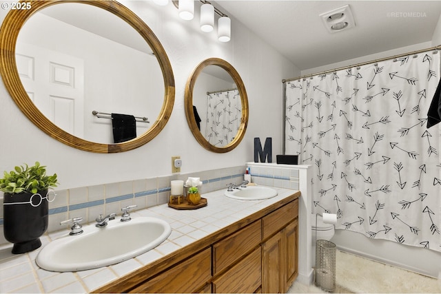 2136 N Thorne St, Newberg, OR 97132 - bathroom featuring double vanity, shower / bath combination with curtain, tasteful backsplash, and toilet