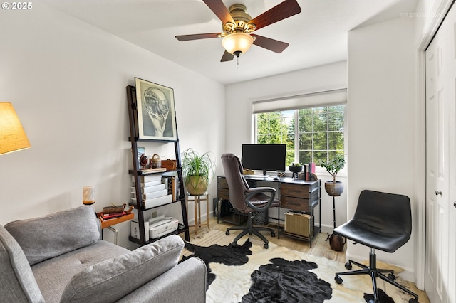 2136 N Thorne St, Newberg, OR 97132 - home office with light wood-style flooring and a ceiling fan