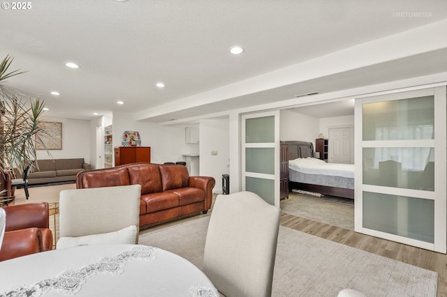 2136 N Thorne St, Newberg, OR 97132 - living area featuring light wood-style flooring and recessed lighting