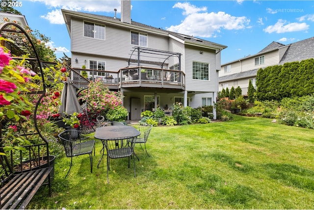 2136 N Thorne St, Newberg, OR 97132 - rear view of property featuring a lawn, a pergola, a chimney, a deck, and outdoor dining space