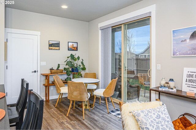 dining room featuring recessed lighting and wood finished floors
