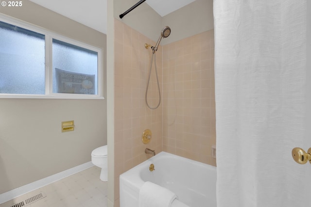 bathroom with toilet, visible vents, baseboards, tile patterned floors, and shower / bath combo with shower curtain