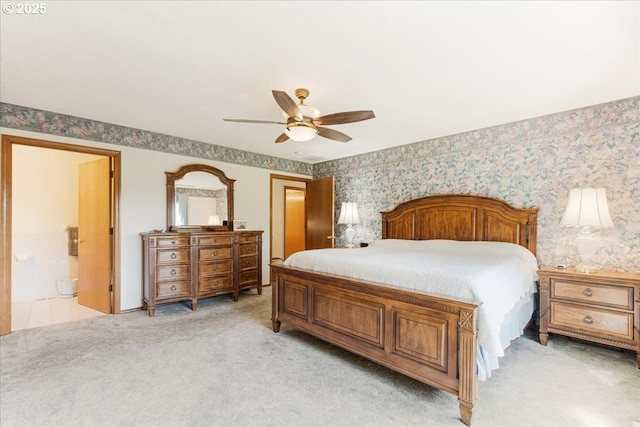 129 Cedar Falls Dr, Kelso, WA 98626 - bedroom with ceiling fan, light carpet, and wallpapered walls