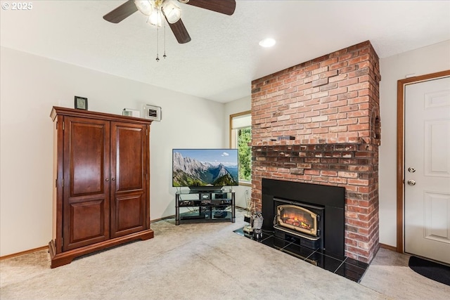 129 Cedar Falls Dr, Kelso, WA 98626 - living room featuring a brick fireplace, ceiling fan, light colored carpet, and baseboards