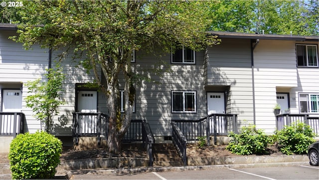 29650 SW Courtside Dr Unit 18, Wilsonville, OR 97070 - view of front of property with uncovered parking