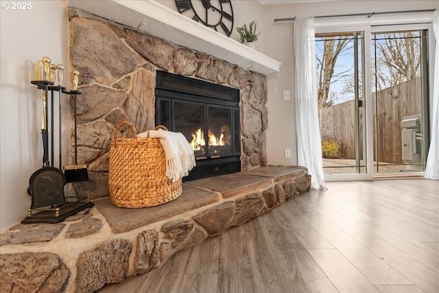 29650 SW Courtside Dr Unit 18, Wilsonville, OR 97070 - detailed view of wood finished floors and a fireplace