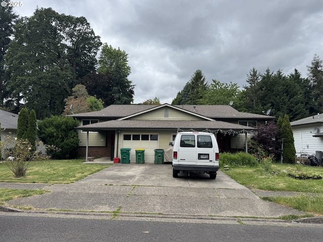 7135 SW Wilson Ave SW, Beaverton, OR 97008 - split level home featuring an attached garage, a shingled roof, concrete driveway, and a front yard