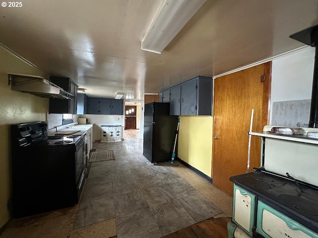 103 B Ave, Seneca, OR 97873 - kitchen with black appliances, dark floors, and range hood