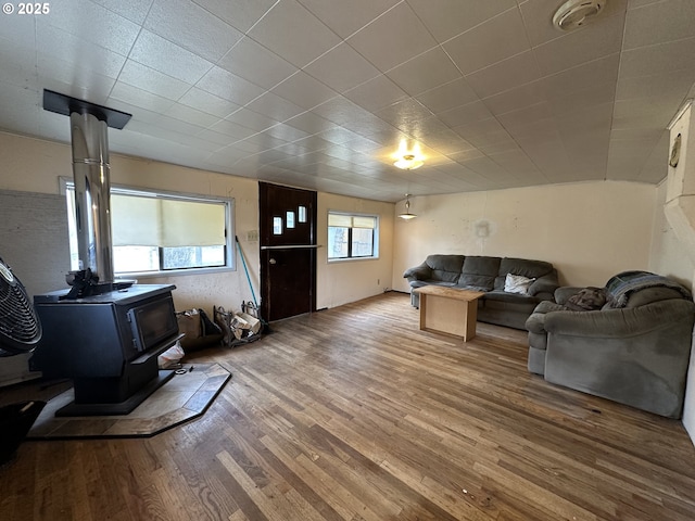 103 B Ave, Seneca, OR 97873 - living area with a wood stove and wood finished floors