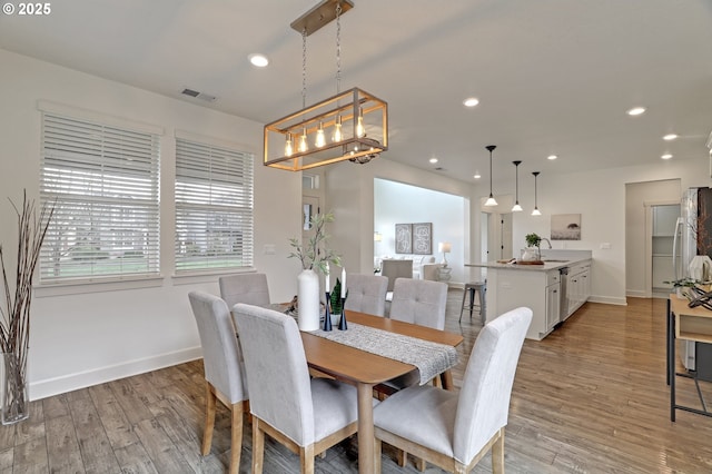 5316 SE Lone Oak St, Hillsboro, OR 97123 - dining space with visible vents, baseboards, light wood-type flooring, and recessed lighting