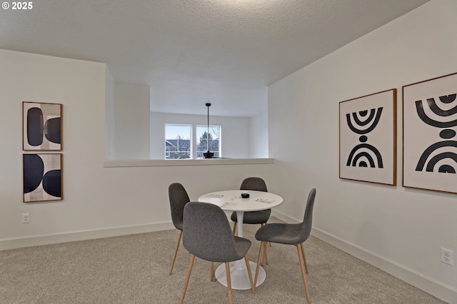 5316 SE Lone Oak St, Hillsboro, OR 97123 - carpeted dining space with a textured ceiling and baseboards