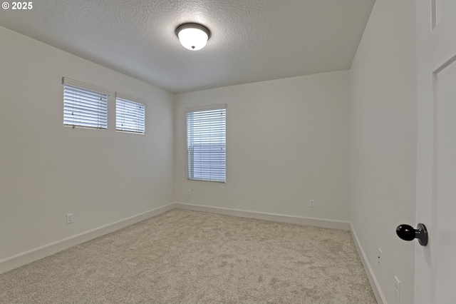 5316 SE Lone Oak St, Hillsboro, OR 97123 - carpeted spare room with a textured ceiling and baseboards