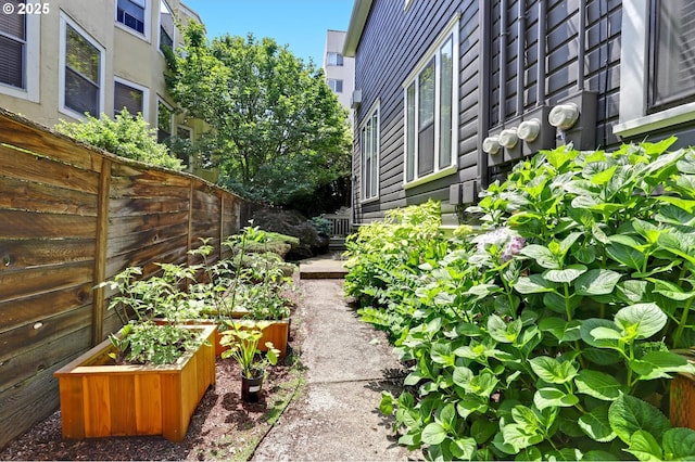 2176 NW Everett St Unit 1, Portland, OR 97210 - view of yard featuring a vegetable garden