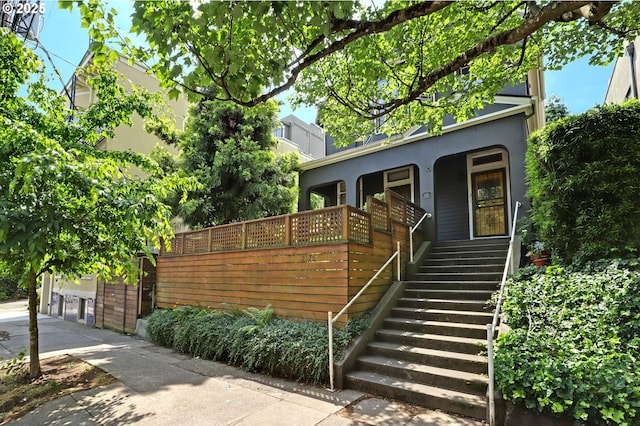 2176 NW Everett St Unit 1, Portland, OR 97210 - view of front of property with stairway and covered porch