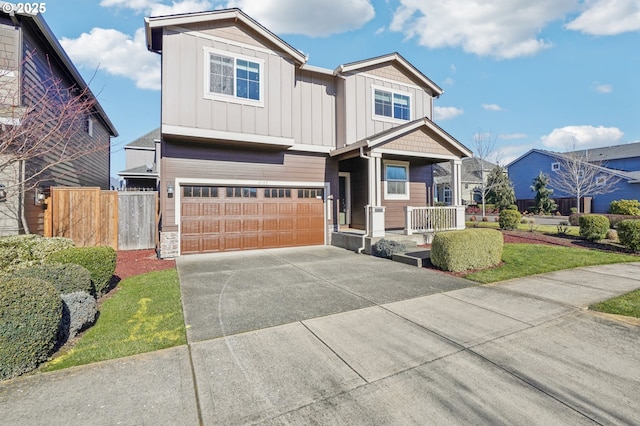 view of front of home featuring a porch and a garage