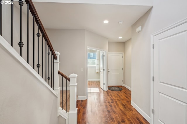 entrance foyer with dark wood-type flooring