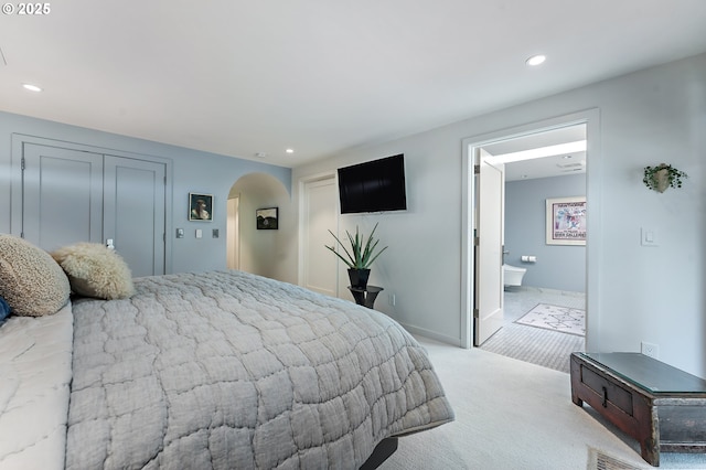 240 Greenridge Dr, Lake Oswego, OR 97035 - carpeted bedroom with arched walkways, recessed lighting, and connected bathroom