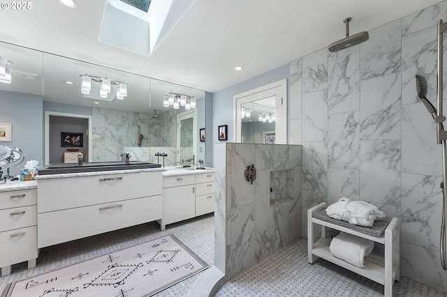 240 Greenridge Dr, Lake Oswego, OR 97035 - full bathroom featuring a marble finish shower, vanity, a skylight, recessed lighting, and tile walls