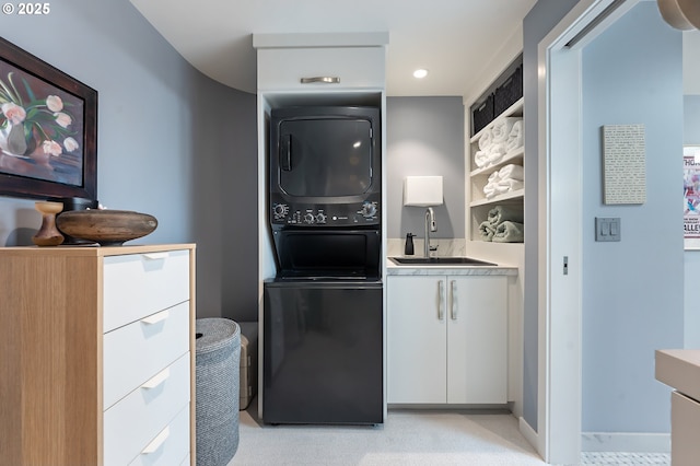 240 Greenridge Dr, Lake Oswego, OR 97035 - laundry area featuring estacked washer and dryer, cabinet space, and recessed lighting