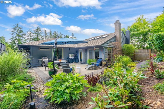 240 Greenridge Dr, Lake Oswego, OR 97035 - rear view of house featuring a patio area and a chimney