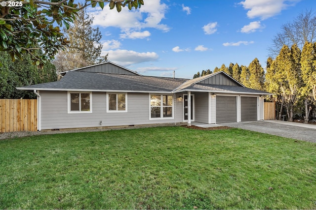 single story home with a garage and a front yard