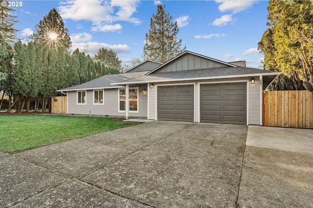 ranch-style house with a garage and a front yard