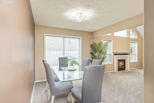 1273 SE Williams Ave, Gresham, OR 97080 - dining room featuring baseboards, carpet flooring, and a textured ceiling