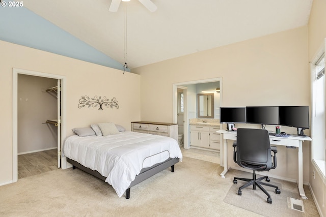 1273 SE Williams Ave, Gresham, OR 97080 - bedroom with ceiling fan, light colored carpet, ensuite bath, lofted ceiling, and visible vents