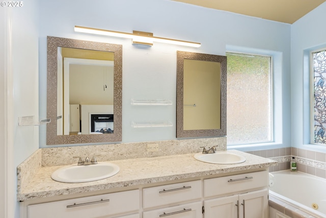 1273 SE Williams Ave, Gresham, OR 97080 - full bath featuring a sink, a jetted tub, and double vanity