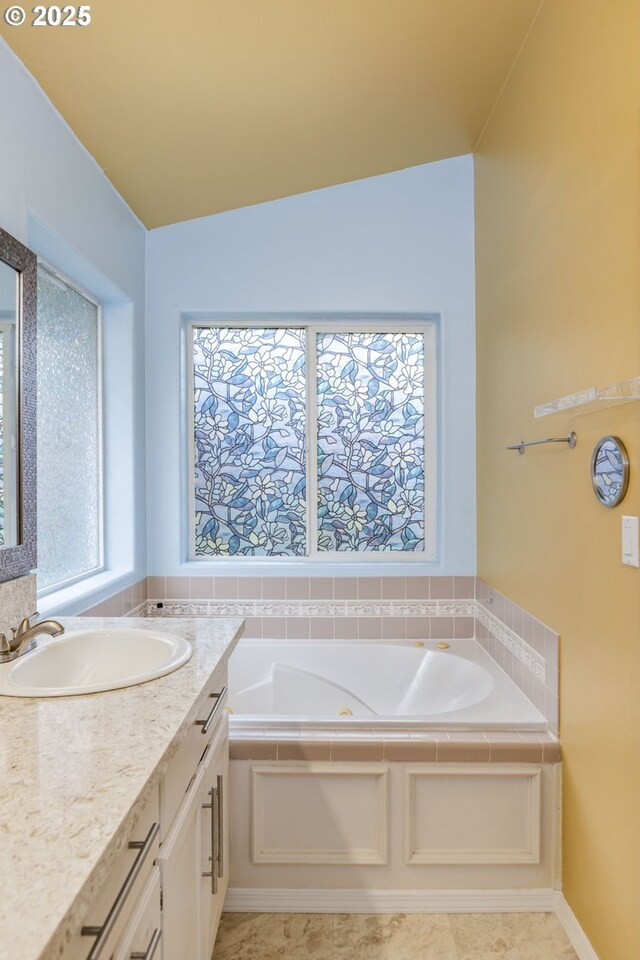 1273 SE Williams Ave, Gresham, OR 97080 - bathroom with a wealth of natural light, a bath, and vanity