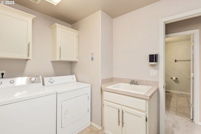 1273 SE Williams Ave, Gresham, OR 97080 - washroom with cabinet space, independent washer and dryer, baseboards, and a sink