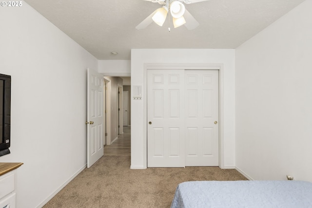 1273 SE Williams Ave, Gresham, OR 97080 - bedroom with baseboards, ceiling fan, light carpet, and a closet