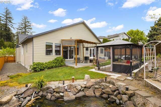 1273 SE Williams Ave, Gresham, OR 97080 - rear view of house with a gazebo, an outdoor hangout area, a patio, a yard, and fence private yard