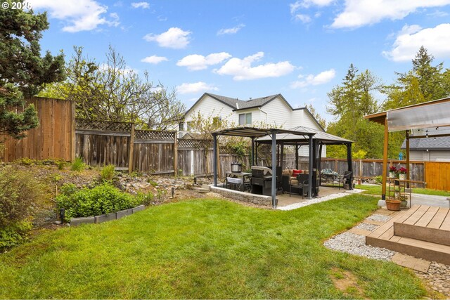 1273 SE Williams Ave, Gresham, OR 97080 - view of yard featuring a fenced backyard, a patio, and a gazebo