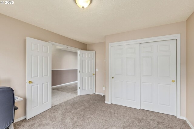 1273 SE Williams Ave, Gresham, OR 97080 - unfurnished office featuring carpet floors, baseboards, and a textured ceiling