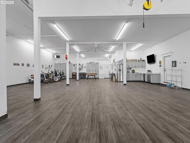 gym featuring dark hardwood / wood-style floors