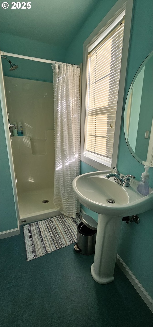 bathroom featuring walk in shower