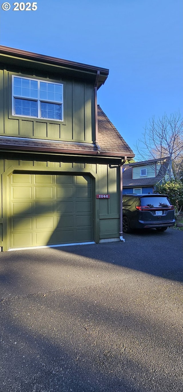 view of home's exterior with a garage