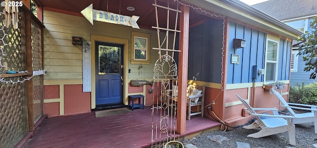 doorway to property featuring a wooden deck