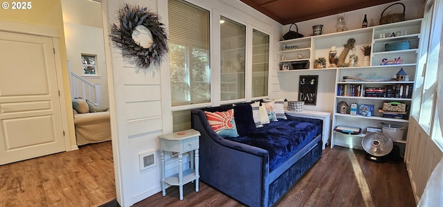 living area with dark hardwood / wood-style floors