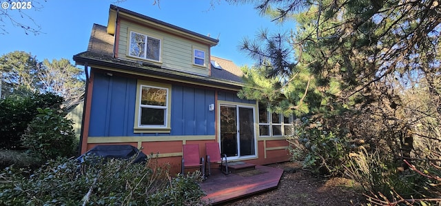 rear view of property with a deck