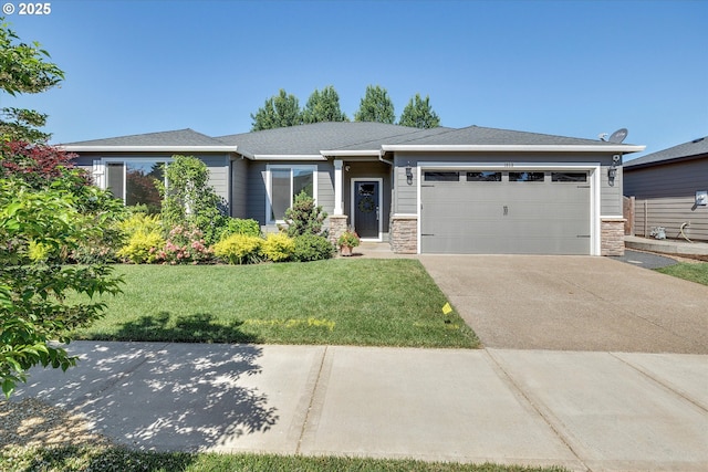 1059 S Walnut St, Canby, OR 97013 - view of front facade featuring an attached garage, a front yard, driveway, and stone siding