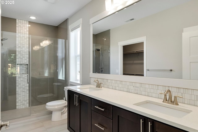 1059 S Walnut St, Canby, OR 97013 - full bath featuring toilet, a shower stall, double vanity, and backsplash