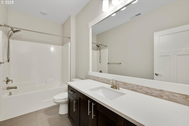 1059 S Walnut St, Canby, OR 97013 - full bath with toilet, vanity, shower / washtub combination, and decorative backsplash