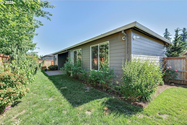 1059 S Walnut St, Canby, OR 97013 - view of side of home with a security system