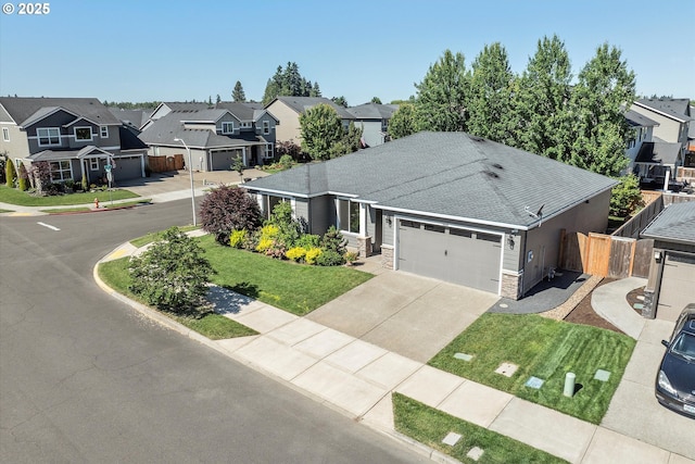 1059 S Walnut St, Canby, OR 97013 - view of front of house with a residential view, stone siding, a garage, driveway, and roof with shingles